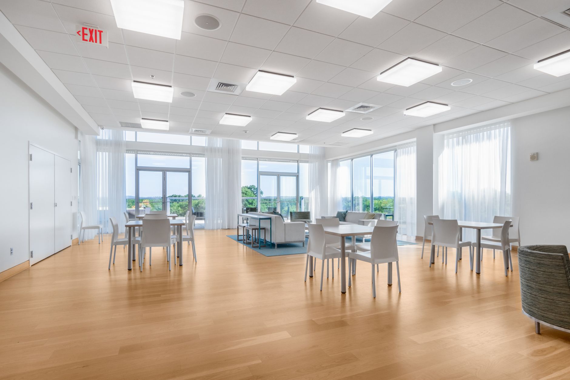 A bright common room arranged for conversation
